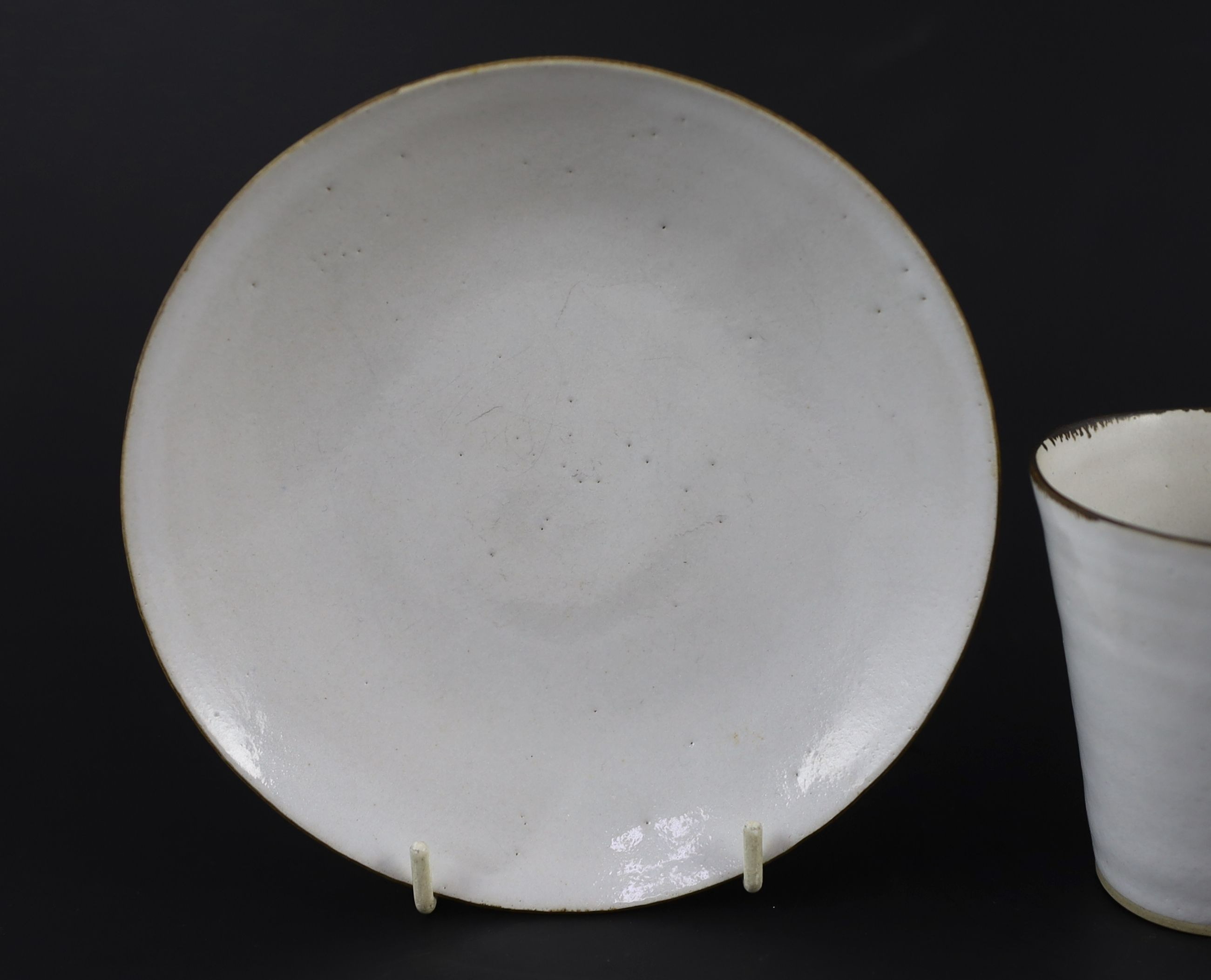 Dame Lucie Rie (1902-1995) a cup, saucer and side plate, c.1959, Cup 8.1 cm high